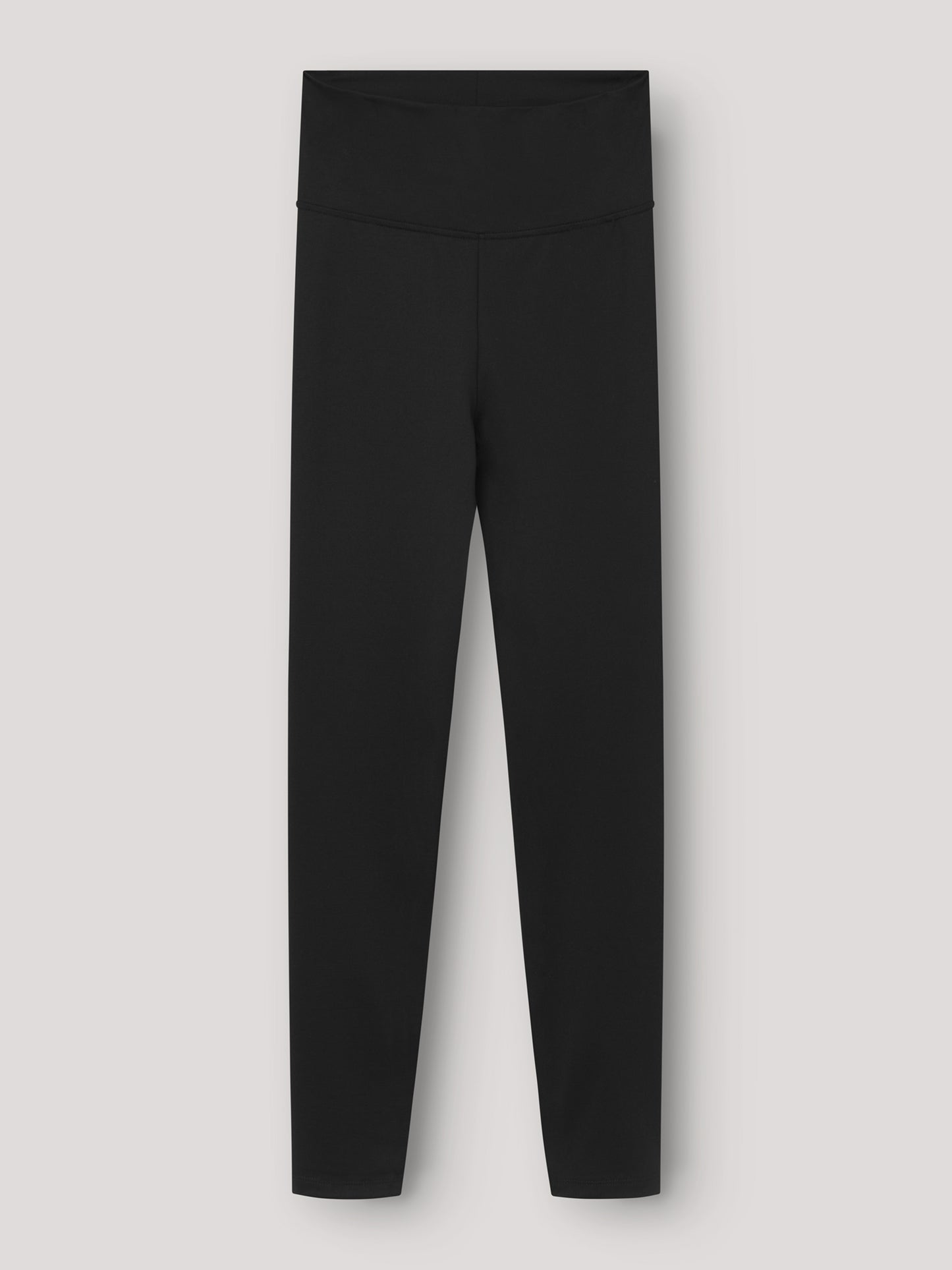 Ein Paar Leggings Schwarz mit hoher Taille, flach auf einem hellgrauen Hintergrund von vorne gezeigt - ideal als bequeme Leggings für Frauen.