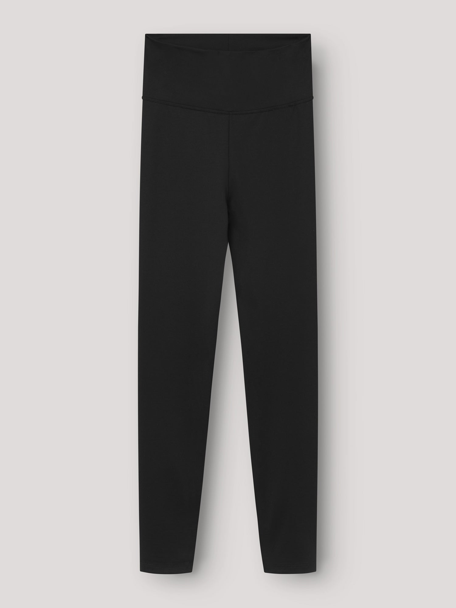 Ein Paar Leggings Schwarz mit hoher Taille, flach auf einem hellgrauen Hintergrund von vorne gezeigt - ideal als bequeme Leggings für Frauen.