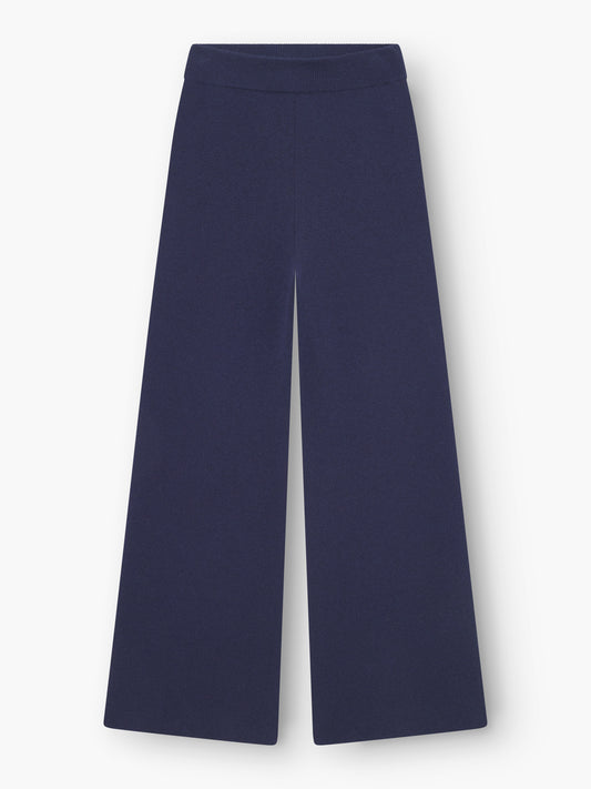 Weit geschnittene Hose Merino Darklblue mit elastischem Bund, flach auf weißem Grund gelegt.