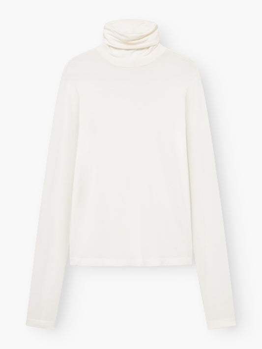 Ein langärmeliges Rollkragen-Shirt der Marke „Turtle Jersey White“ liegt flach auf einem weißen Hintergrund, die Ärmel sind ausgestreckt und der Kragen ist heruntergeklappt.