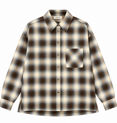 Bluse Boxy Long Check Black Brown-ONE: ein übergroßes, langärmeliges Flanellhemd mit schwarz-braunem Karomuster und einer Brusttasche.
