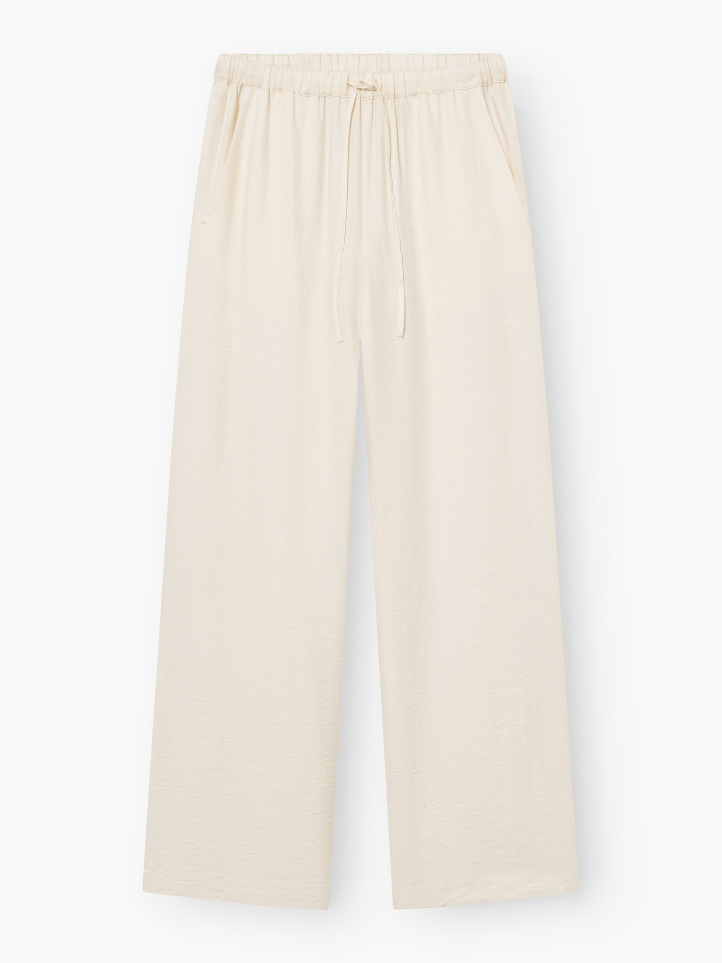 Die Hose Draw Off White ist eine locker sitzende, weit geschnittene Sommerhose mit elastischem Bund und Kordelzug aus leichtem Stoff. Diese fließende Hose hat Seitentaschen und bietet einen entspannten, lässigen Stil für warme Tage.