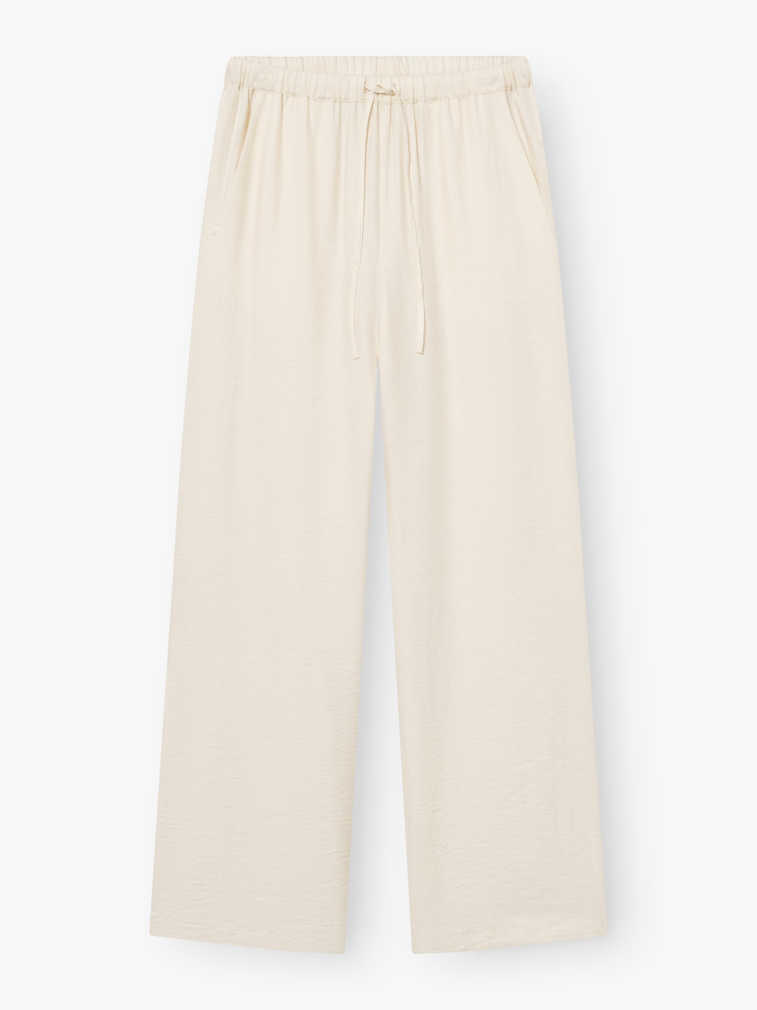 Die Hose Draw Off White ist eine locker sitzende, weit geschnittene Sommerhose mit elastischem Bund und Kordelzug aus leichtem Stoff. Diese fließende Hose hat Seitentaschen und bietet einen entspannten, lässigen Stil für warme Tage.