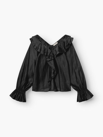 Das Ruffle Long Sleeve Black besteht aus glänzendem, leichtem Stoff mit einem gerüschten V-Ausschnitt und Manschetten. Dieses nachhaltige Kleidungsstück bietet eine lockere, fließende Passform und dezenten Glanz für mühelose Eleganz.