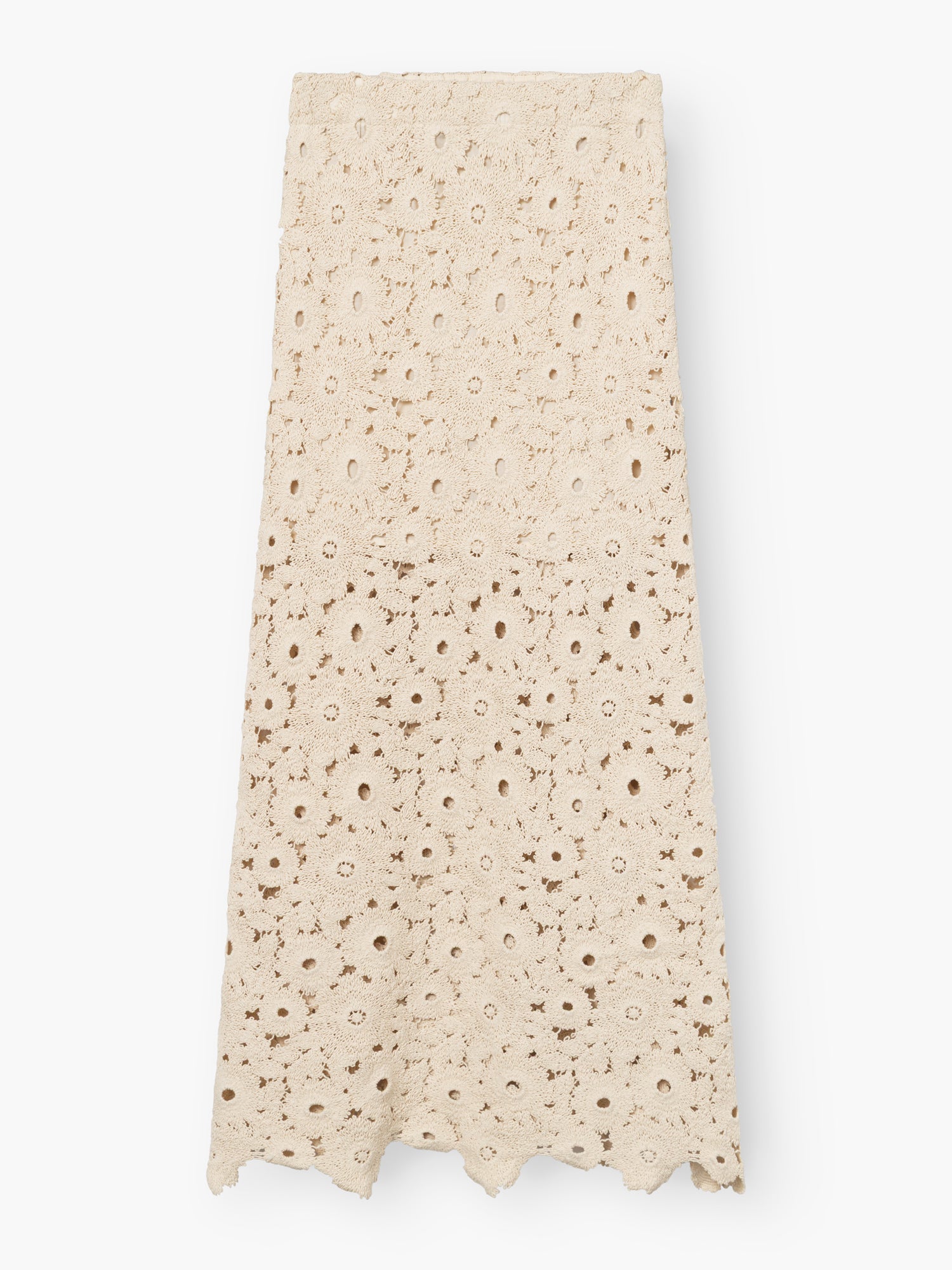 Die Vest Ibiza ist ein beigefarbener, knöchellanger Häkelrock mit einem floralen Spitzenmuster und einem überschnittenen Saum für zusätzliche Details in seinem zarten, luftigen Design.