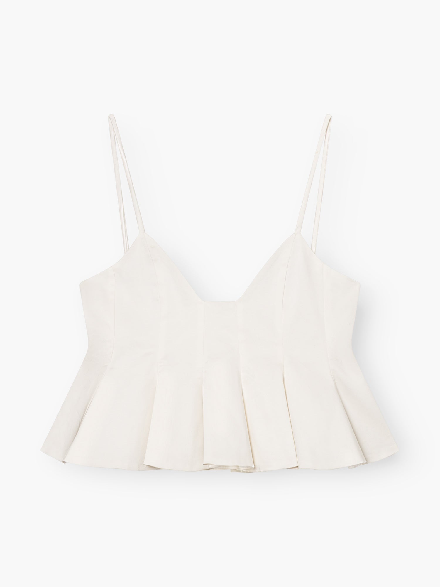 Das Top Audrey White ist ein sommerliches Essential für Damen mit schmalen Spaghettiträgern und einem ausgestellten, plissierten Schößchensaum auf weißem Grund.